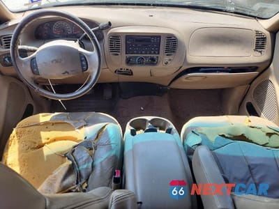 Zdjęcie 8 z 12 samochodu: 2000 FORD F150 VIN:1FTRX17L2YKA72908 - miniatura