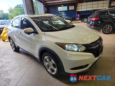 Czwarte zdjęcie samochodu z boku: 2016 HONDA HR-V EXL VIN:3CZRU6H7XGM727681 - miniatura