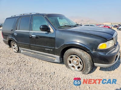 Czwarte zdjęcie samochodu z boku: 2001 LINCOLN NAVIGATOR VIN:5LMFU28R91LJ30932 - miniatura