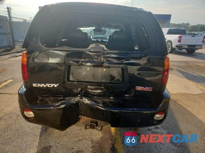 Zdjęcie 6 z 13 samochodu: 2004 GMC ENVOY VIN:1GKDT13S642342398 - miniatura