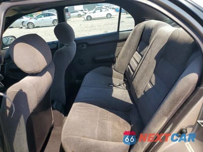 Zdjęcie 10 z 12 samochodu: 1994 TOYOTA COROLLA DX VIN:1NXAE09B6RZ204099 - miniatura