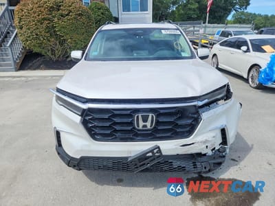 Piąte zdjęcie samochodu w środku: 2025 HONDA PILOT TOURING VIN:5FNYG1H78SB120347 - miniatura