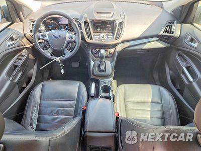 Zdjęcie 8 z 14 samochodu: 2014 FORD ESCAPE TITANIUM VIN:1FMCU0J94EUE51359 - miniatura