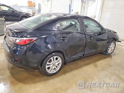 Trzecie zdjęcie samochodu z tyłu: 2017 TOYOTA YARIS IA BASE VIN:3MYDLBYV3HY152975 - miniatura