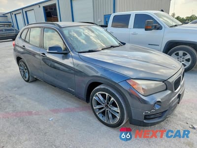 Czwarte zdjęcie samochodu z boku: 2014 BMW X1 XDRIVE28I VIN:WBAVL1C55EVY19023 - miniatura