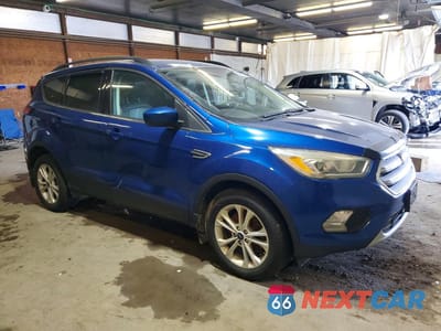 Czwarte zdjęcie samochodu z boku: 2018 FORD ESCAPE SEL VIN:1FMCU9HD9JUB39143 - miniatura