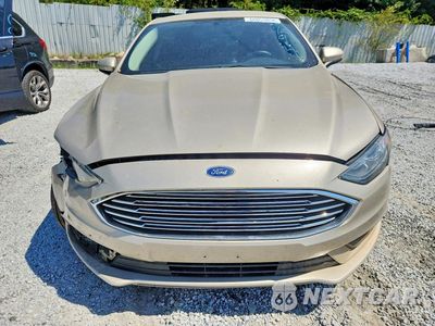 Piąte zdjęcie samochodu w środku: 2017 FORD FUSION SE HYBRID VIN:3FA6P0LU4HR385794 - miniatura