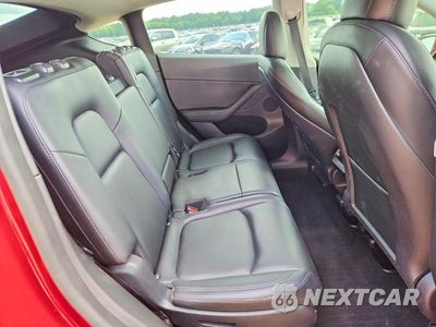 Zdjęcie 11 z 14 samochodu: 2022 TESLA MODEL Y VIN:7SAYGAEE4NF542464 - miniatura