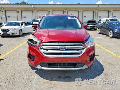 Piąte zdjęcie samochodu w środku: 2017 FORD ESCAPE TITANIUM VIN:1FMCU9J94HUB23173 - miniatura