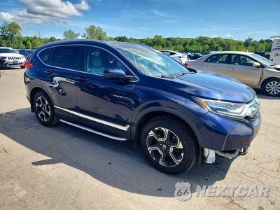 Czwarte zdjęcie samochodu z boku: 2017 HONDA CR-V TOURING VIN:2HKRW2H95HH637128 - miniatura