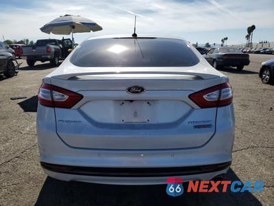Zdjęcie 6 z 12 samochodu: 2016 FORD FUSION TITANIUM PHEV VIN:3FA6P0SU5GR157013 - miniatura