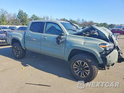 Czwarte zdjęcie samochodu z boku: 2022 TOYOTA TACOMA TRD SPORT VIN:3TYCZ5AN3NT087119 - miniatura