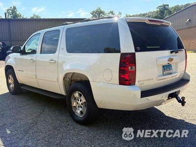 Trzecie zdjęcie samochodu z tyłu: 2012 CHEVROLET SUBURBAN K1500 LT VIN:1GNSKJE70CR204318 - miniatura