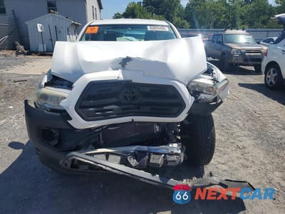 Piąte zdjęcie samochodu w środku: 2017 TOYOTA TACOMA SR VIN:5TFSX5EN3HX053557 - miniatura