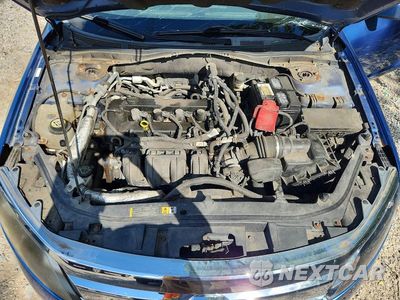 Zdjęcie 11 z 12 samochodu: 2010 FORD FUSION SE VIN:3FAHP0HA8AR124908 - miniatura