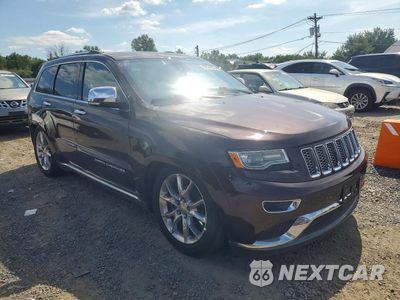 Czwarte zdjęcie samochodu z boku: 2014 JEEP GRAND CHEROKEE SUMMIT VIN:1C4RJFJT3EC441269 - miniatura