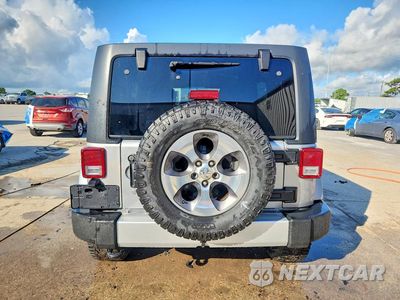 Zdjęcie 6 z 13 samochodu: 2017 JEEP WRANGLER UNLIMITED SAHARA VIN:1C4HJWEGXHL677379 - miniatura