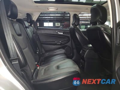 Zdjęcie 11 z 13 samochodu: 2018 FORD EDGE TITANIUM VIN:2FMPK4K97JBB20708 - miniatura