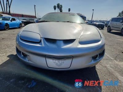 Piąte zdjęcie samochodu w środku: 1999 PONTIAC FIREBIRD VIN:2G2FS22KXX2224078 - miniatura