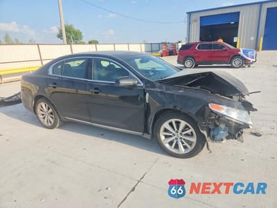 Czwarte zdjęcie samochodu z boku: 2009 LINCOLN MKS VIN:1LNHM93R39G603983 - miniatura