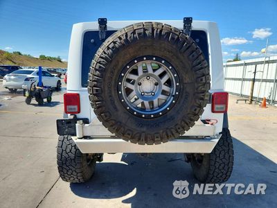 Zdjęcie 6 z 13 samochodu: 2011 JEEP WRANGLER UNLIMITED SAHARA VIN:1J4HA5H11BL574984 - miniatura