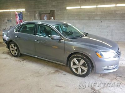 Czwarte zdjęcie samochodu z boku: 2015 VOLKSWAGEN PASSAT S VIN:1VWAT7A37FC111663 - miniatura