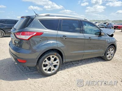 Trzecie zdjęcie samochodu z tyłu: 2015 FORD ESCAPE TITANIUM VIN:1FMCU0J96FUB12247 - miniatura