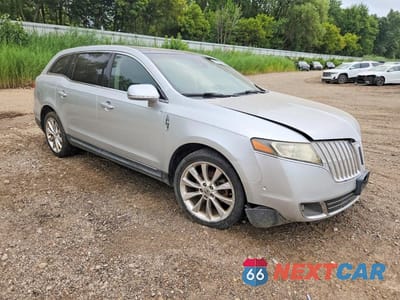 Czwarte zdjęcie samochodu z boku: 2012 LINCOLN MKT VIN:2LMHJ5AT9CBL54379 - miniatura