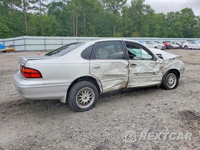 Trzecie zdjęcie samochodu z tyłu: 1999 TOYOTA AVALON XLS VIN:4T1BF18B5XU321064 - miniatura