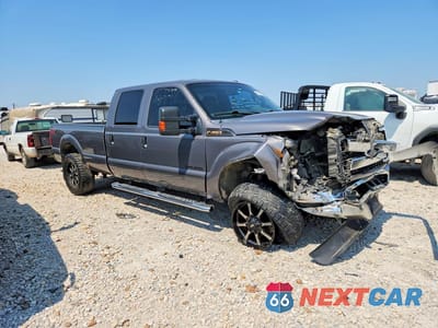 Czwarte zdjęcie samochodu z boku: 2014 FORD F350 SUPER DUTY VIN:1FT8W3BT5EEB64882 - miniatura
