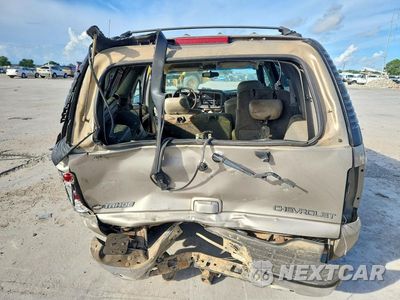 Zdjęcie 6 z 14 samochodu: 2001 CHEVROLET TAHOE C1500 VIN:1GNEC13T71J118283 - miniatura