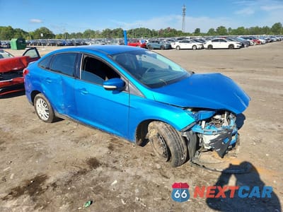Czwarte zdjęcie samochodu z boku: 2013 FORD FOCUS SE VIN:1FADP3F22DL269957 - miniatura
