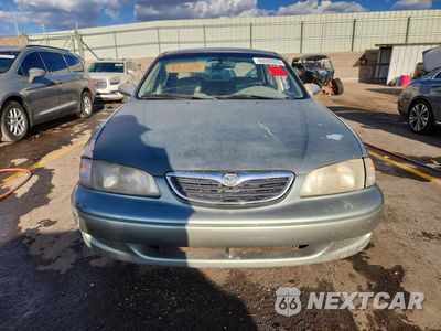 Piąte zdjęcie samochodu w środku: 1999 MAZDA 626 ES VIN:1YVGF22D4X5901243 - miniatura