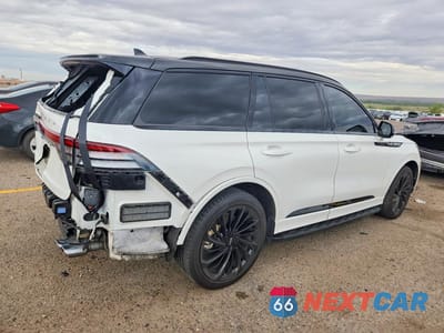 Trzecie zdjęcie samochodu z tyłu: 2023 LINCOLN AVIATOR RESERVE VIN:5LM5J7XC4PGL06575 - miniatura