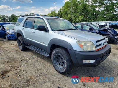 Czwarte zdjęcie samochodu z boku: 2003 TOYOTA 4RUNNER SR5 VIN:JTEBT14R130012950 - miniatura
