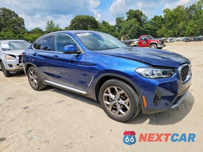 Czwarte zdjęcie samochodu z boku: 2024 BMW X4 XDRIVE30I VIN:5UX33DT04R9W15181 - miniatura