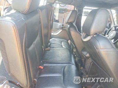 Zdjęcie 11 z 14 samochodu: 2015 JEEP WRANGLER UNLIMITED SAHARA VIN:1C4BJWEG0FL537960 - miniatura