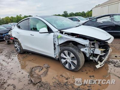 Czwarte zdjęcie samochodu z boku: 2023 TESLA MODEL Y VIN:7SAYGDEE5PF797211 - miniatura