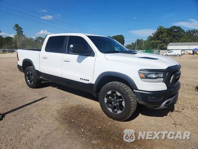 Czwarte zdjęcie samochodu z boku: 2020 RAM 1500 REBEL VIN:1C6SRFLT0LN234967 - miniatura