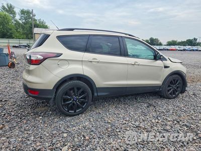 Trzecie zdjęcie samochodu z tyłu: 2017 FORD ESCAPE TITANIUM VIN:1FMCU0J91HUB27080 - miniatura