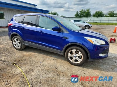 Czwarte zdjęcie samochodu z boku: 2015 FORD ESCAPE SE VIN:1FMCU0GX4FUC37527 - miniatura