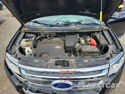 Zdjęcie 12 z 13 samochodu: 2014 FORD EDGE SEL VIN:2FMDK3JC3EBB71977 - miniatura