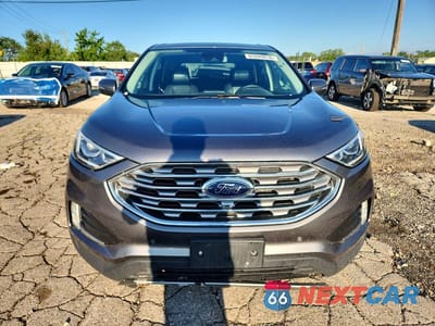 Piąte zdjęcie samochodu w środku: 2022 FORD EDGE TITANIUM VIN:2FMPK4K92NBA55708 - miniatura