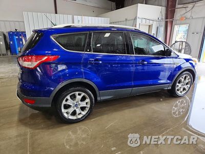 Trzecie zdjęcie samochodu z tyłu: 2014 FORD ESCAPE TITANIUM VIN:1FMCU0JX5EUD71566 - miniatura