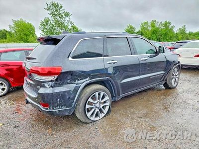 Trzecie zdjęcie samochodu z tyłu: 2017 JEEP GRAND CHEROKEE OVERLAND VIN:1C4RJFCG3HC684889 - miniatura