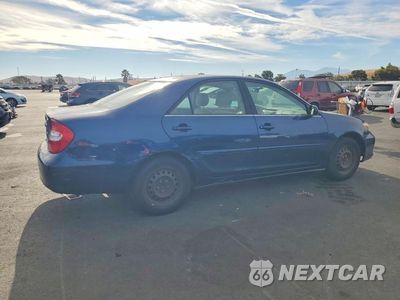 Trzecie zdjęcie samochodu z tyłu: 2002 TOYOTA CAMRY LE VIN:JTDBE32K020096063 - miniatura