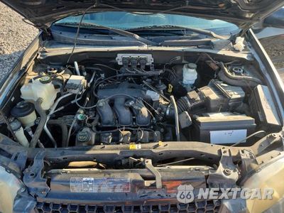 Zdjęcie 12 z 13 samochodu: 2005 FORD ESCAPE XLT VIN:1FMYU03195KB94319 - miniatura