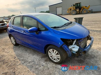 Czwarte zdjęcie samochodu z boku: 2015 HONDA FIT LX VIN:3HGGK5H52FM786073 - miniatura
