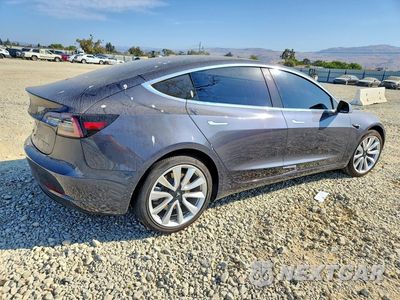 Trzecie zdjęcie samochodu z tyłu: 2018 TESLA MODEL 3 VIN:5YJ3E1EB9JF185070 - miniatura