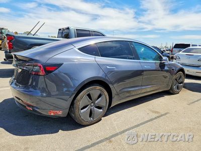 Trzecie zdjęcie samochodu z tyłu: 2018 TESLA MODEL 3 VIN:5YJ3E1EA0JF016398 - miniatura